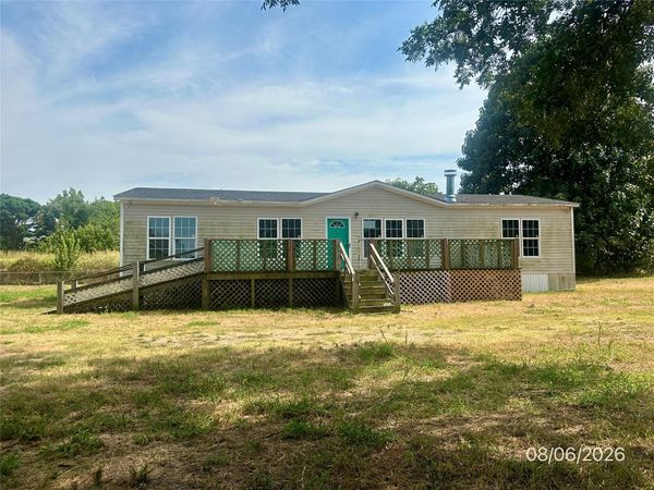 202 E I Avenue , Milburn, OK 73450
