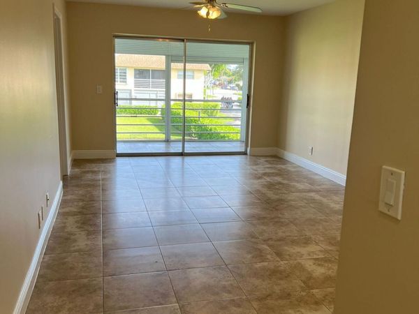 9851 SANDALFOOT Boulevard, Unit 212, Boca Raton, FL 33428
