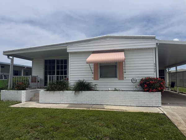 6948 SE DELEGATE Street, Hobe Sound, FL 33455