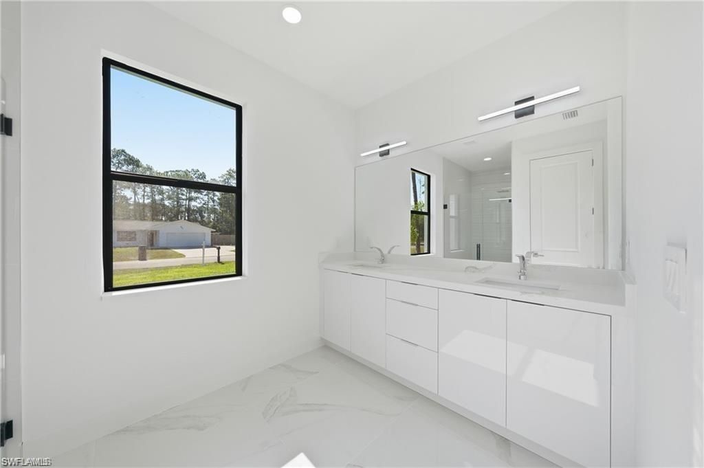 303 Mcarthur Ave , Lehigh Acres, FL 33936 Photo