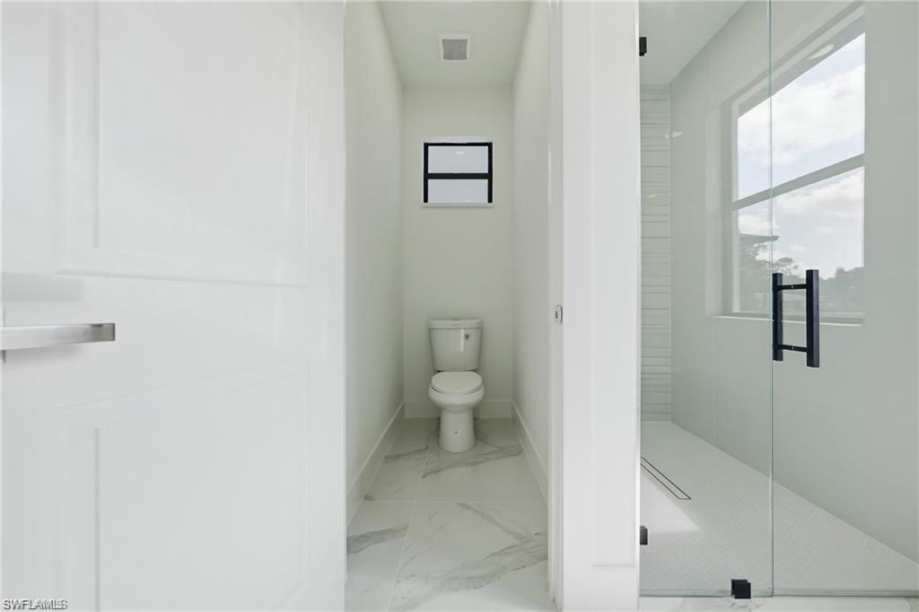 303 Mcarthur Ave , Lehigh Acres, FL 33936 Photo