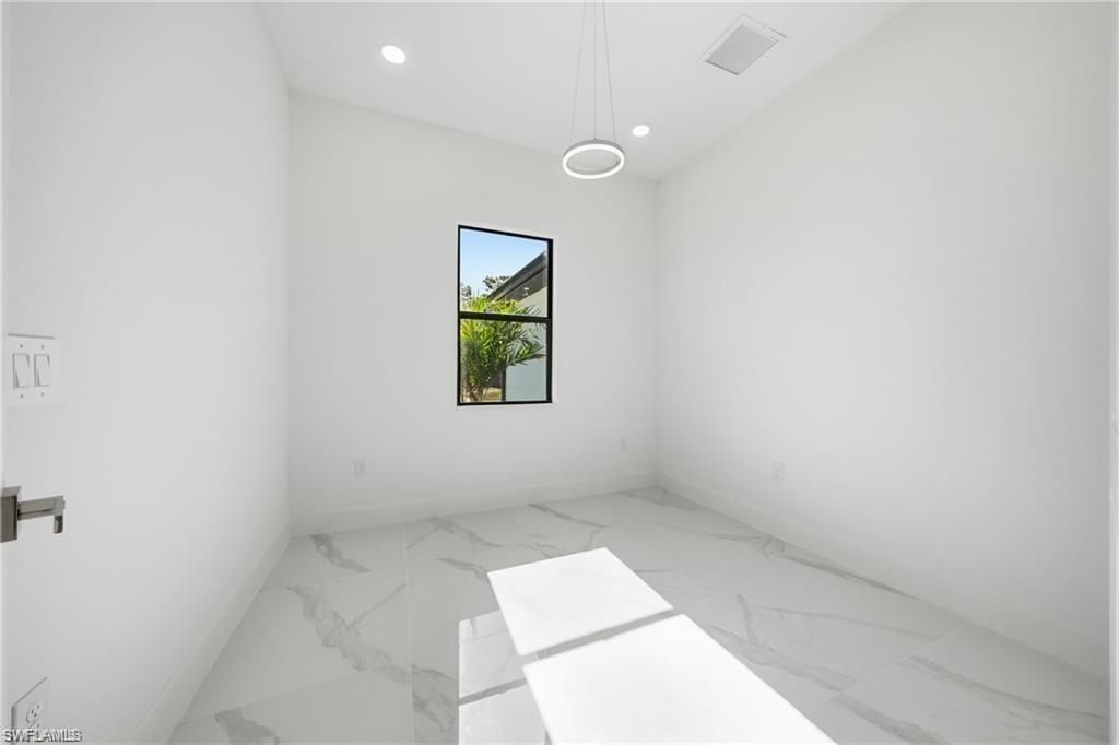 303 Mcarthur Ave , Lehigh Acres, FL 33936 Photo