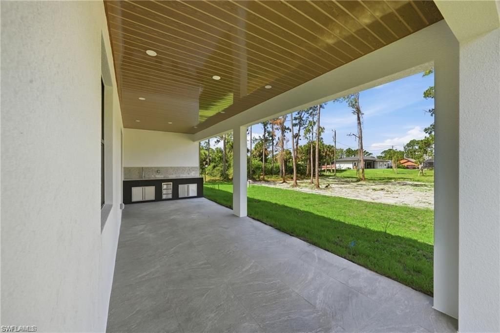 303 Mcarthur Ave , Lehigh Acres, FL 33936 Photo