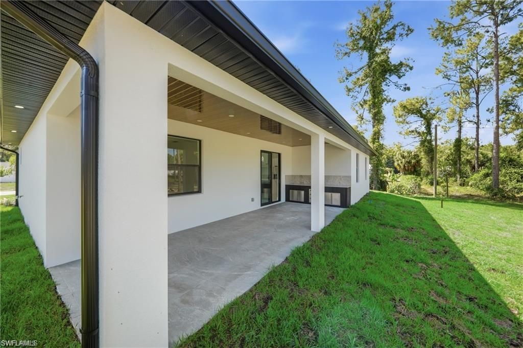 303 Mcarthur Ave , Lehigh Acres, FL 33936 Photo