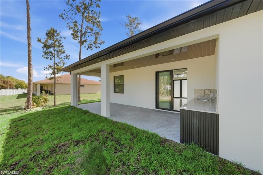 303 Mcarthur Ave , Lehigh Acres, FL 33936 Photo