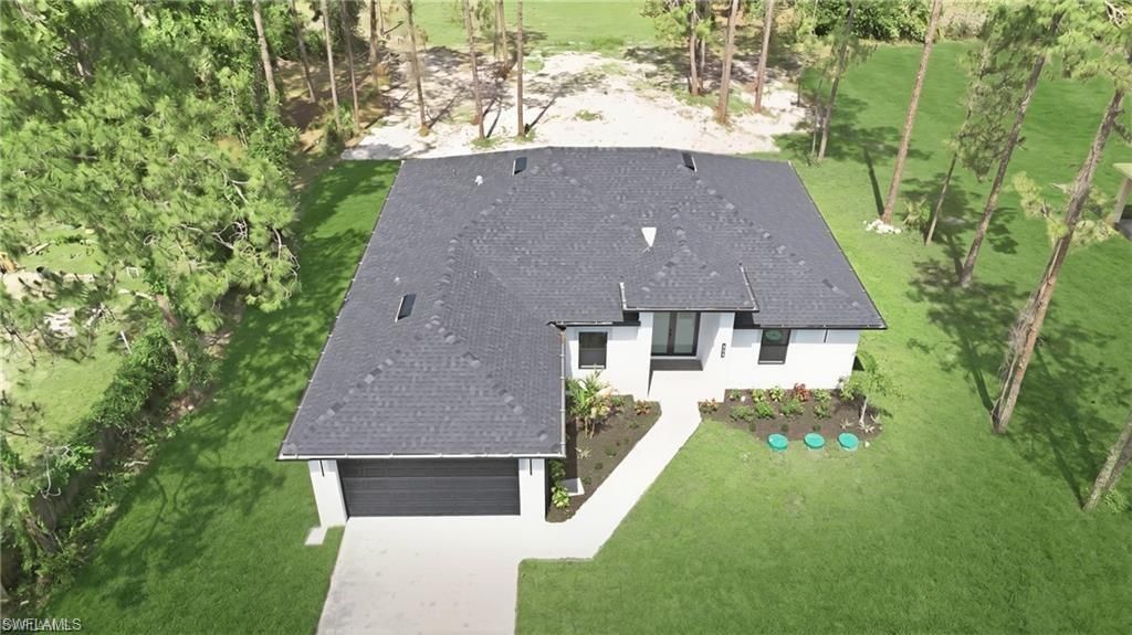 303 Mcarthur Ave , Lehigh Acres, FL 33936 Photo