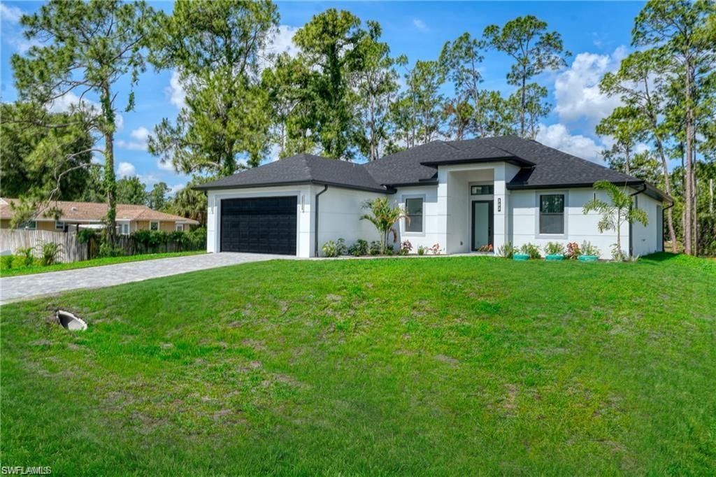 303 Mcarthur Ave , Lehigh Acres, FL 33936 Photo