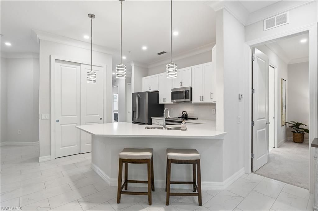 238 Indies Dr E, Unit 201, Naples, FL 34114 Photo