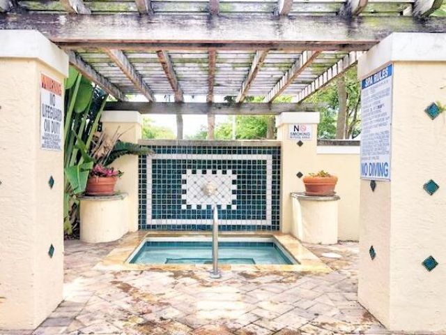 1721 Village Boulevard, Unit 103, West Palm Beach, FL 33409 Photo