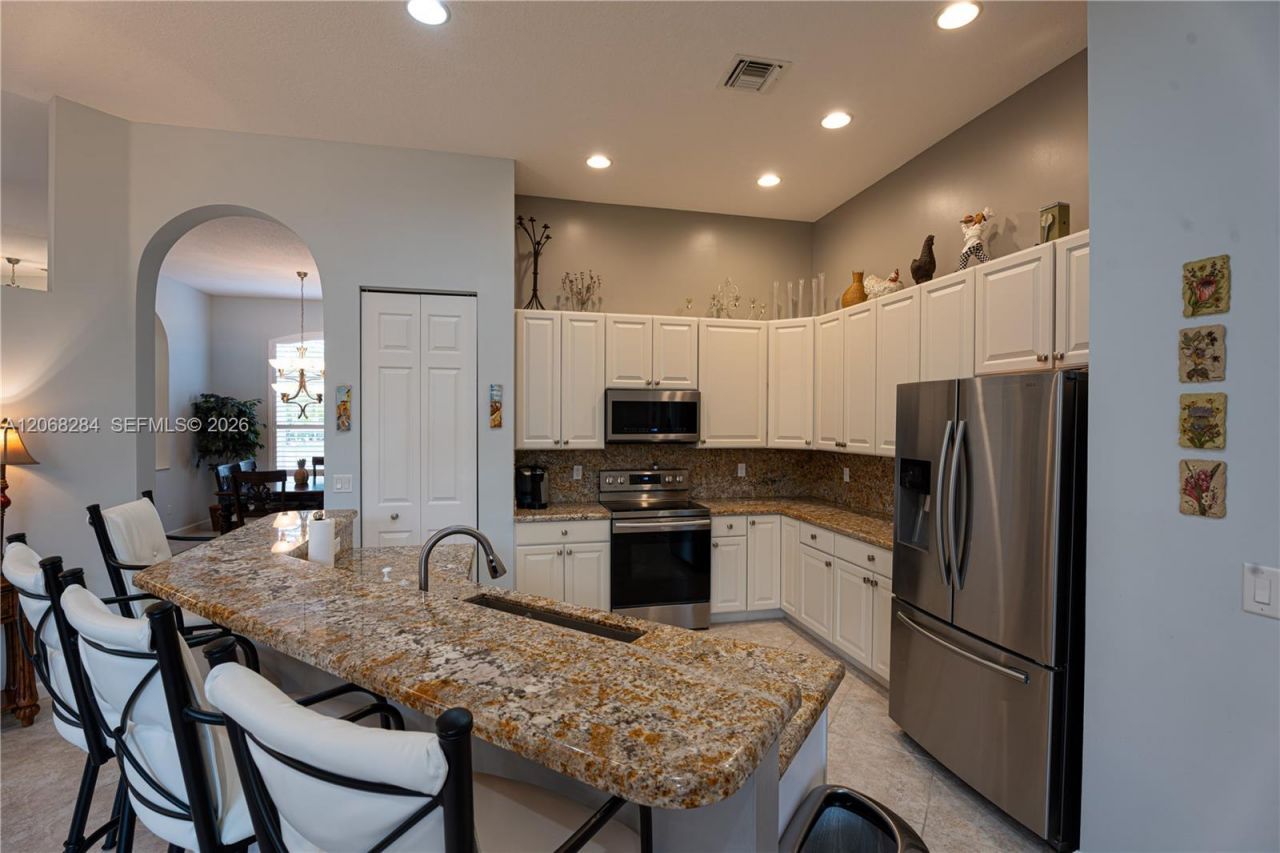 6918 SE Sleepy Hollow Ln, Stuart, FL 34997 Photo