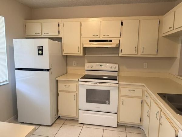 22064 PALMS Way, Unit 102, Boca Raton, FL 33433