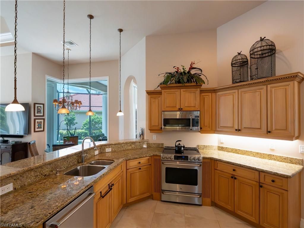 7937 Tiger Lily Dr, Naples, FL 34113 Photo