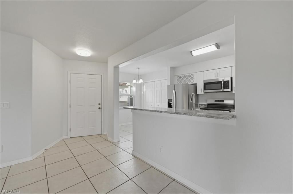 9570 Crescent Garden Dr, Unit A102, Naples, FL 34109 Photo