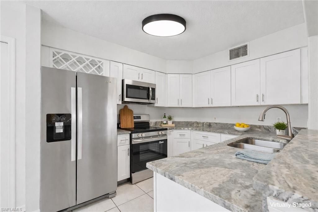 9570 Crescent Garden Dr, Unit A102, Naples, FL 34109 Photo