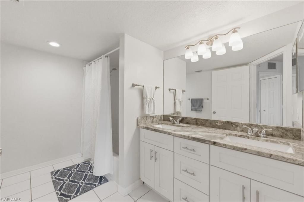 9570 Crescent Garden Dr, Unit A102, Naples, FL 34109 Photo