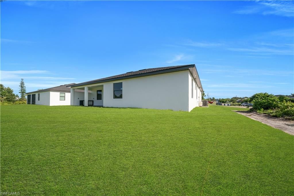 695 Whitmore Loop , Lehigh Acres, FL 33972 Photo