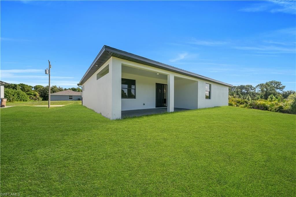 695 Whitmore Loop , Lehigh Acres, FL 33972 Photo
