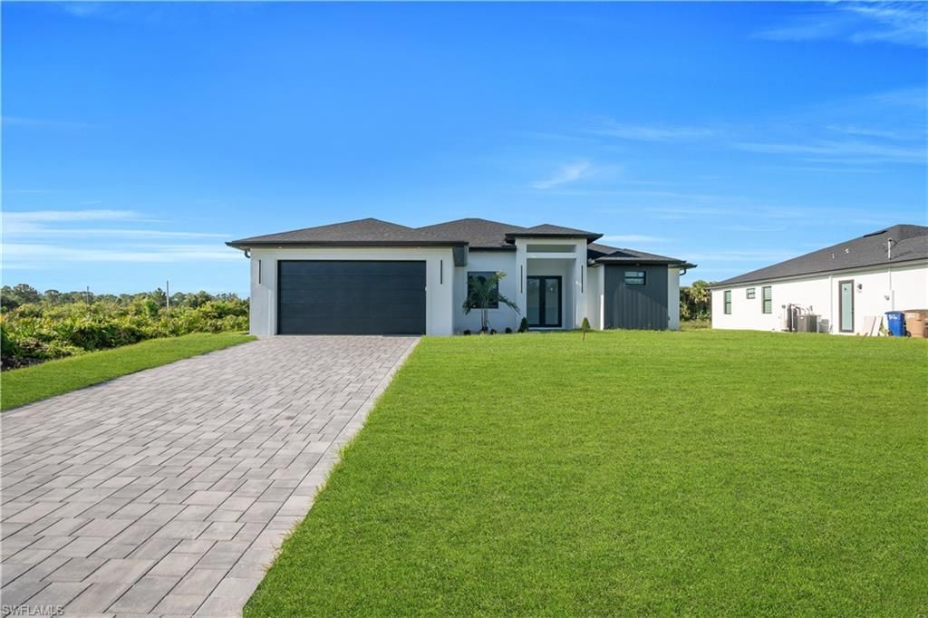 695 Whitmore Loop , Lehigh Acres, FL 33972 Photo