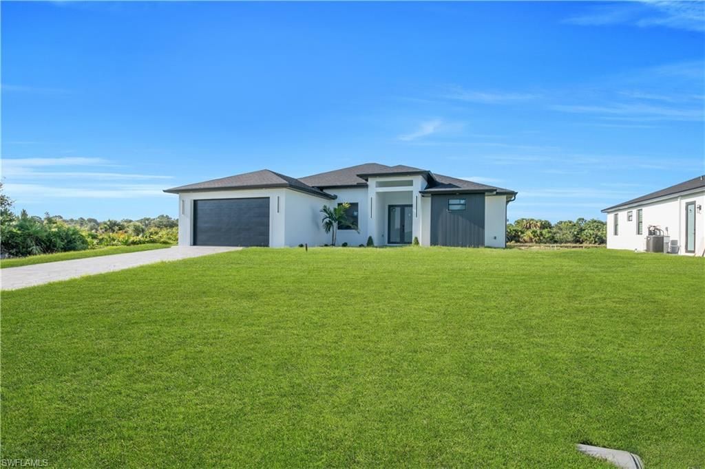 695 Whitmore Loop , Lehigh Acres, FL 33972 Photo