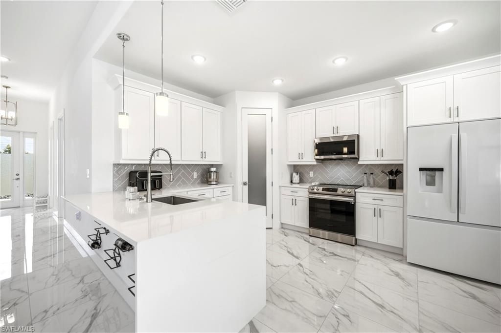 310 NW 14th St , Cape Coral, FL 33993 Photo