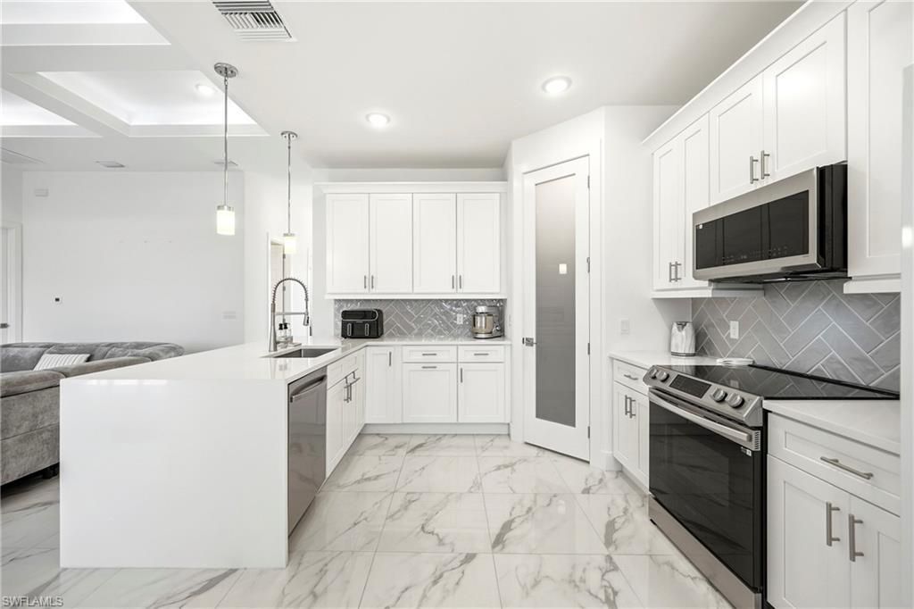 310 NW 14th St , Cape Coral, FL 33993 Photo