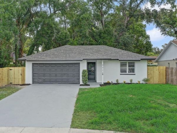 7711 LAKESIDE WOODS DRIVE , ORLANDO, FL 32810
