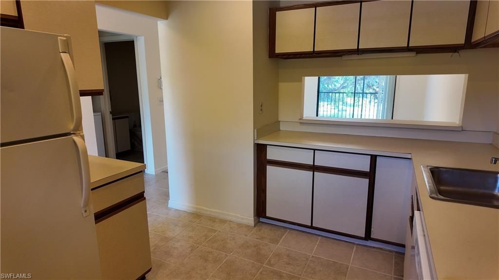 5257 Treetops Dr , Unit X202, Naples, FL 34113 Photo