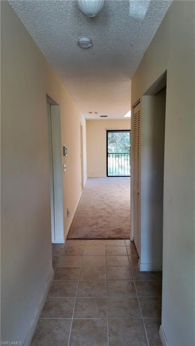5257 Treetops Dr , Unit X202, Naples, FL 34113 Photo