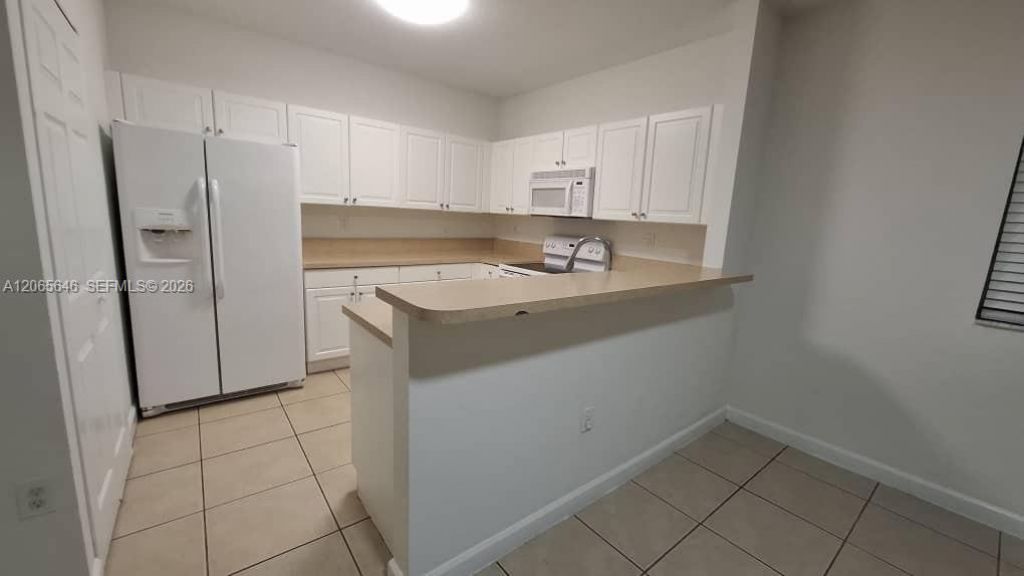 1720 NE 33rd Ave , Unit 110-5, Homestead, FL 33033 Photo