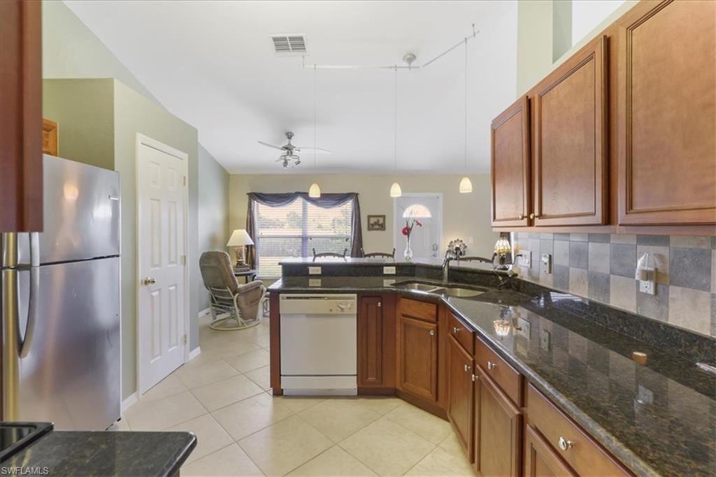 8141 Liriope Loop , Lehigh Acres, FL 33972 Photo