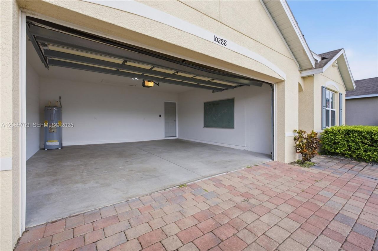 10288 Silver Pond Ln , Lehigh Acres, FL 33936 Photo
