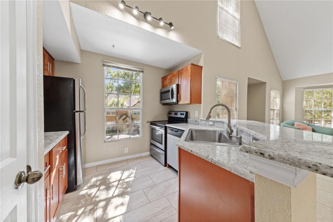 6340 Raleigh Street , Unit 1011, Orlando, FL 32835 Photo