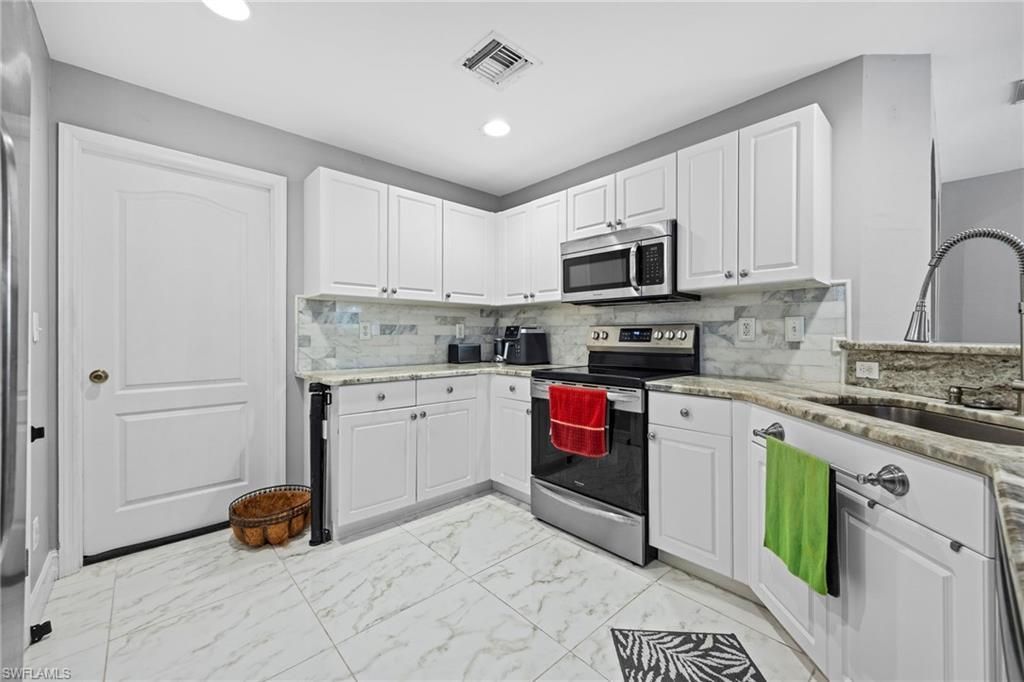 421 Broadmoor St , Lehigh Acres, FL 33974 Photo