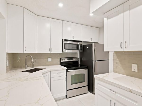 609 SEA PINE Way, Unit F2, Greenacres, FL 33415