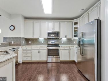 15140 HEATHER MILL LANE, Unit 404, HAYMARKET, VA 20169