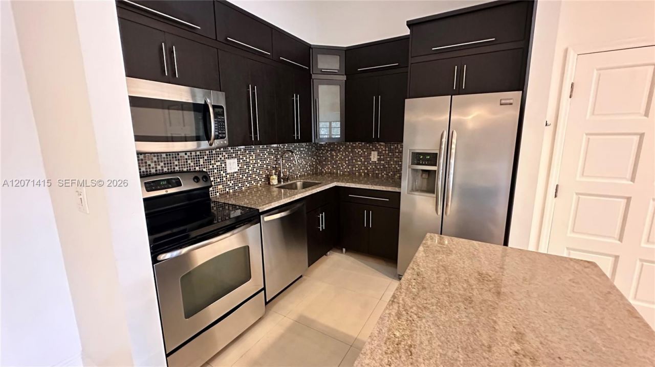 4944 NW 102nd Ave , Unit 203-3, Doral, FL 33178 Photo