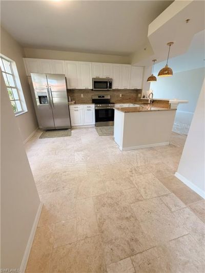 7518 Silver Trumpet Ln , Unit 101, Naples, FL 34109 Photo
