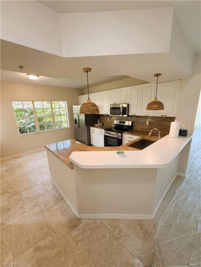 7518 Silver Trumpet Ln , Unit 101, Naples, FL 34109 Photo