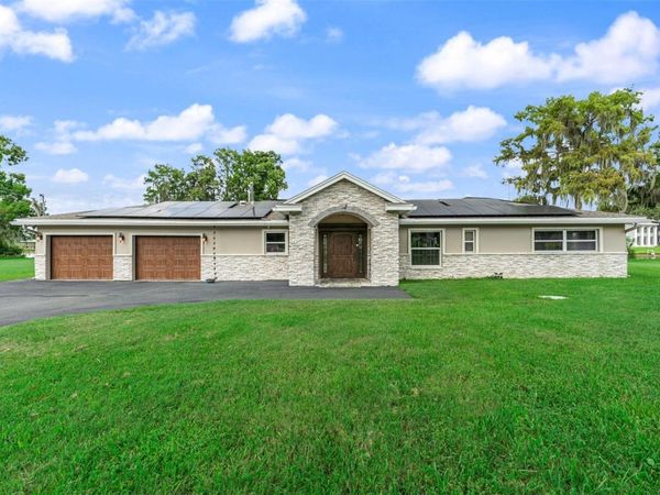 1002 LOVES POINT DRIVE , LEESBURG, FL 34748