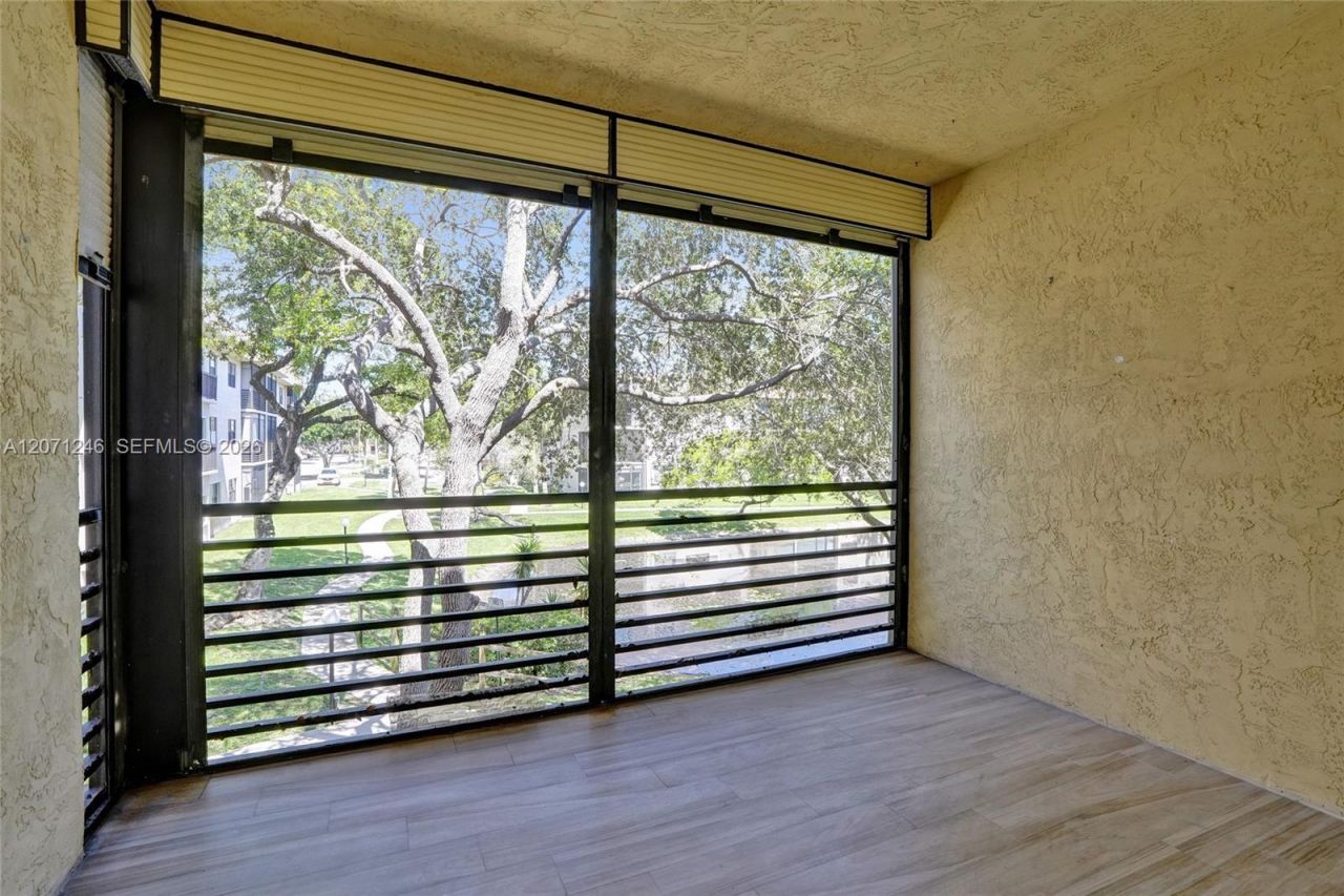 6090 N Sabal Palm Blvd , Unit 208, Tamarac, FL 33319 Photo