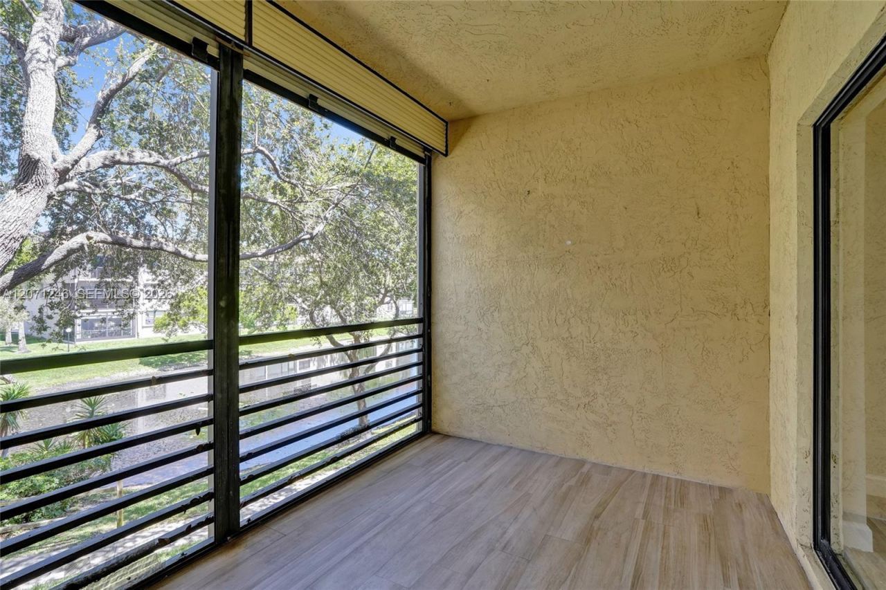 6090 N Sabal Palm Blvd , Unit 208, Tamarac, FL 33319 Photo