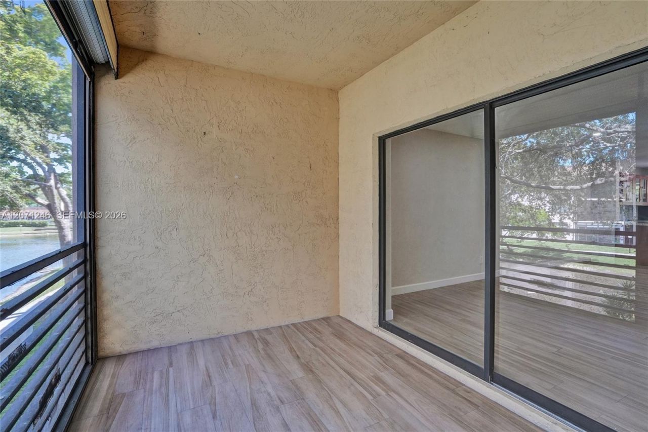 6090 N Sabal Palm Blvd , Unit 208, Tamarac, FL 33319 Photo