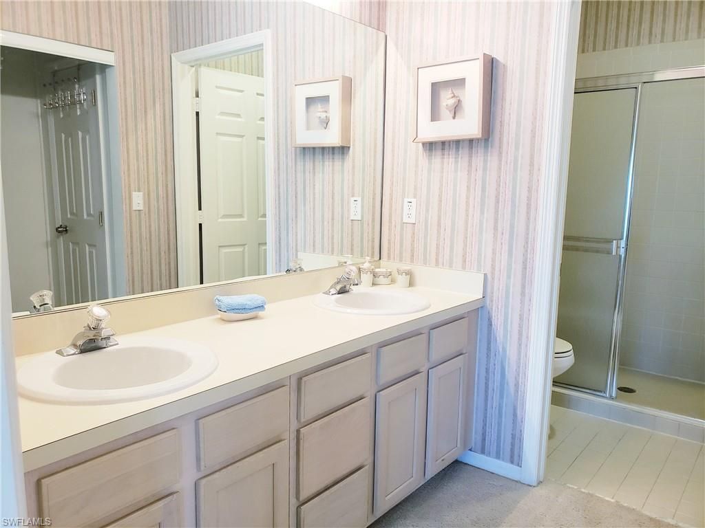 661 Wiggins Lake Dr, Unit 201, Naples, FL 34110 Photo