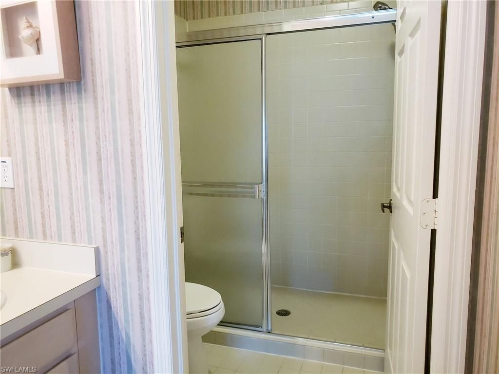 661 Wiggins Lake Dr, Unit 201, Naples, FL 34110 Photo