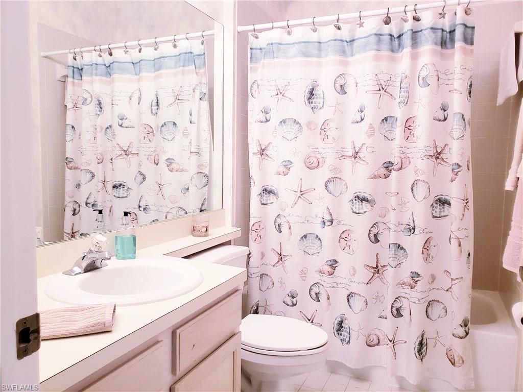 661 Wiggins Lake Dr, Unit 201, Naples, FL 34110 Photo