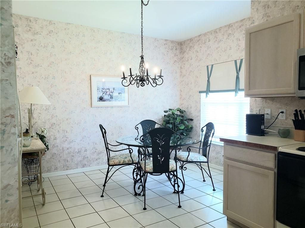 661 Wiggins Lake Dr, Unit 201, Naples, FL 34110 Photo