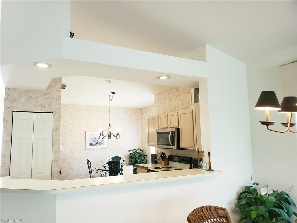 661 Wiggins Lake Dr, Unit 201, Naples, FL 34110 Photo