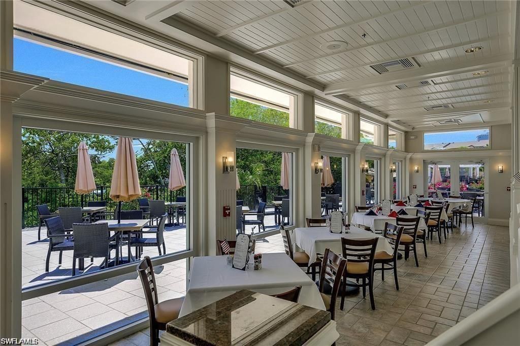 661 Wiggins Lake Dr, Unit 201, Naples, FL 34110 Photo