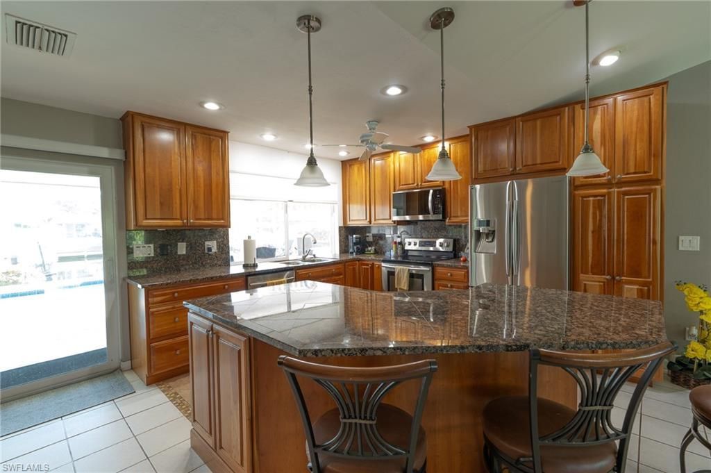 115 SE 35th Ter, Cape Coral, FL 33904 Photo
