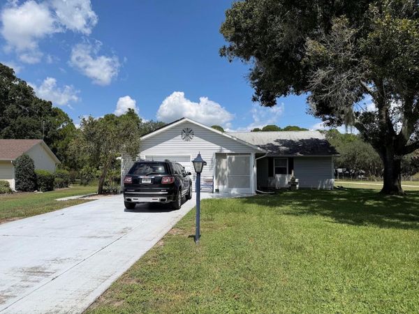 1410 NEW ABBEY AVENUE , LEESBURG, FL 34788